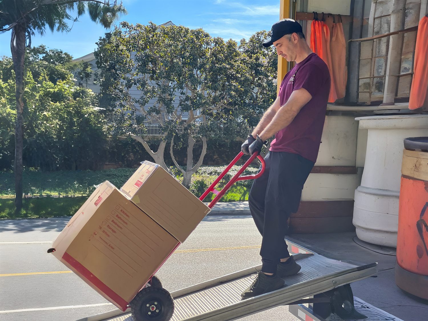 Easy Moving LA mover loading boxes into a truck